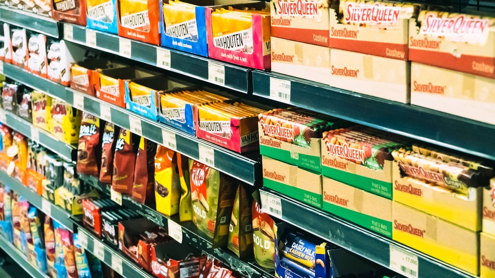A wide view down a modern supermarket aisle